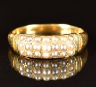 Late Victorian 18ct gold ring set with three rows of seed pearls, 3.5g, size N