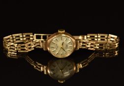 Rotary 9ct gold ladies wristwatch with two-tone hands and baton hour markers, silver dial and signed