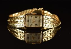 Juvenia 14ct gold ladies wristwatch with gold hands and Roman numerals, silver dial and quartz