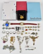 A collection of costume jewellery including two silver rings, necklaces, earrings etc