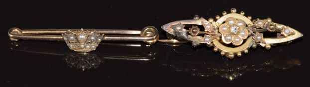 A 14ct gold brooch set with seed pearls in a coronet (2g) and a 9ct gold brooch set with a diamond