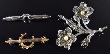 A 9ct gold crescent brooch (2.3g), Charles Horner silver brooch and a silver brooch set with