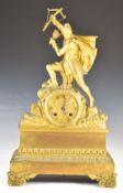 French gilt metal mantel clock with figural archer to top, the movement marked Alexandre Roussel,