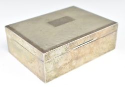Elizabeth II hallmarked silver cigarette box with engine turned lid, Birmingham 1973, maker W T