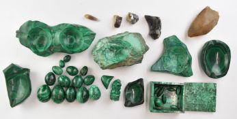 Malachite carved stone items to include trinket box, bowls, eggs and beads, together with further