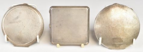 Three various hallmarked silver compacts, each with Art Deco engine turned decoration, Birmingham