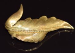 An 18k gold brooch in the form of a leaf with textured detail, 11.4g