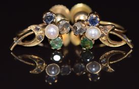 A pair of yellow metal earrings each set with rose cut diamonds, an emerald, split pearl and