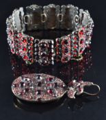 Victorian silver locket set with Bohemian garnet, verso a hinged locket compartment and a