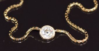 An 18ct gold necklace set with an old cut diamond of approximately 0.5ct, 5.7g