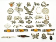Thirty two silver brooches including marcasite, mother of pearl, cameo, pressed amber, insects,