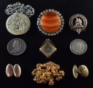 A collection of jewellery including agate brooch, coins, compass charm etc