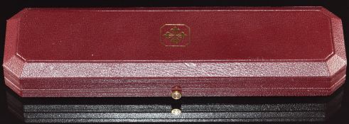 Patek Philippe maroon leather wristwatch box, 23.7x6.7x3cm.