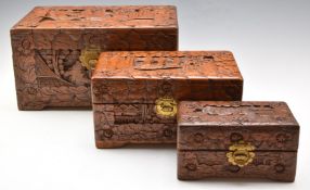 Novelty nesting set of three carved Chinese miniature or apprentice chests, largest 31 x 21 x 17cm