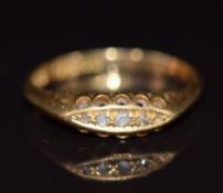 An 18ct gold ring set with diamonds, Birmingham 1919, 2.9g, size Q