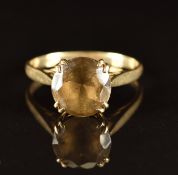 A 9ct gold ring set with a round cut quartz, 2.8g, size O