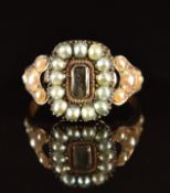 Victorian mourning ring set with split pearls and a glass compartment to the centre, 3.6g, size P