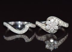 A 9ct white gold ring set with diamonds in a cluster, with matching curved wedding band set with