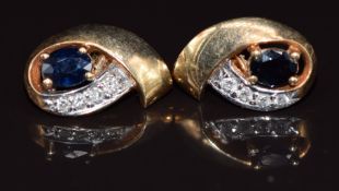 A pair of 10k gold earrings set with a sapphire and diamonds, 2.5g