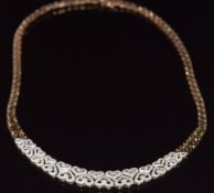 A 9ct gold necklace made up of heart shaped links set with diamonds, 40cm, 26.3g