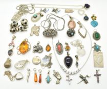 Forty two silver pendants/ necklaces including amethyst, quartz, pressed amber, St Christopher,