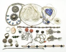 A collection of silver jewellery including multi strand necklaces, brooch set with pearls, silver