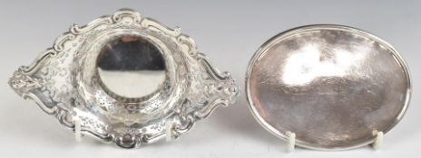 Silver bon bon dish with pierced and embossed decoration, marked sterling, length 14cm, weight