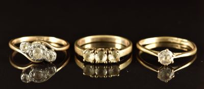 Three 9ct gold rings set with paste, 6.1g, size N/O