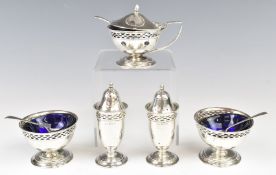 George V hallmarked silver five piece cruet set with blue glass liners, Birmingham 1913, maker