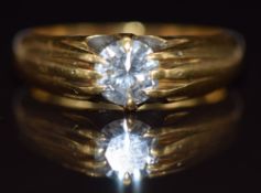 An 18ct gold ring set with a round cut diamond of approximately 0.92ct, 9.2g, size R