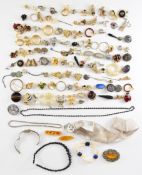 A collection of jewellery including Sphinx earrings, vintage earrings, pearl and lapis lazuli