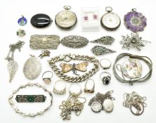 A collection of silver jewellery including three lockets, three silver and marcasite brooches, six