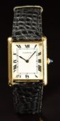 Cartier Tank 18ct gold gentleman's wristwatch with blued hands, Roman numerals, white dial, sapphire