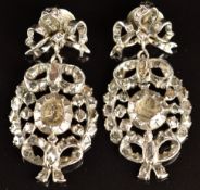 A pair of Georgian silver earrings set with rose cut foiled diamonds in a bow design, 10.1g