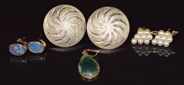 Three pairs of 9ct gold earrings including a pair set with opal triplets and another pair set with