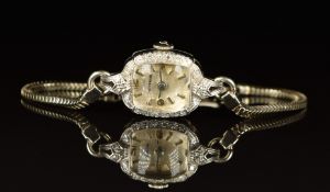 Wittnauer iridium platinum ladies cocktail wristwatch with dilver hands, hour markers and dial,