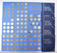 A collection of UK half crowns including pre-1920 and pre-1947 examples, contained in Whitman