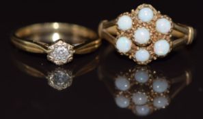 A 9ct gold ring set with opals and a 9ct gold ring set with a diamond, 4.7g, sizes P & L