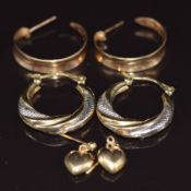Three pairs of 9ct gold earrings including two pairs of hoops and one in the form of hearts, 4.1g
