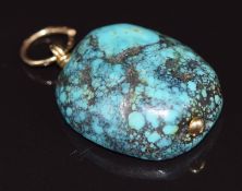 A turquoise pendant with 9ct gold pendant mount, 10.3g