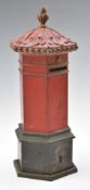 Victorian novelty moneybox in the form of a hexagonal country house post box, with acanthus leaf top