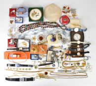 A collection of jewellery including mother of pearl carved St Giuseppe, glass bangle, watches,