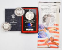 US Mint 1983 Olympic silver dollar no 1345684 in presentation box, together with a Pobjoy Mint