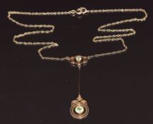 Edwardian 9ct gold necklace set with two round cut peridots, 2.7g