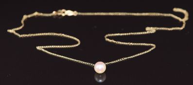 A 14k gold chain and pearl pendant, 1g