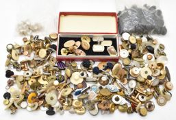 A collection of cufflinks and studs including Victorian gold plated, a single banded agate, mother