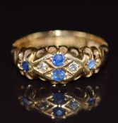 An 18ct gold ring set with sapphires and diamonds, Birmingham 1912, 2.5g, size L