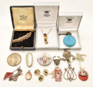 Three silver necklaces set with coral, a silver necklace set with pressed amber and another set with