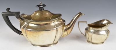 Edward VII hallmarked silver bachelor's teapot and milk jug, Sheffield 1908, maker Henry Stratford