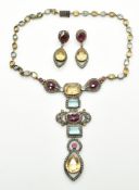 A silver necklace set with topaz, citrine, quartz and diamonds, with matching earrings